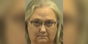 Former office manager of murder victim charged with embezzlement