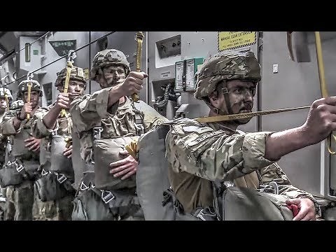 Jumping Out Of Planes: US Army Paratroopers Jump Exercise