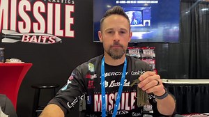 7.4K views · 945 reactions | Talking Ike’s Monster Jig here at the Big Rock Show. Not just a big jig, it’s giant! The response has been very good from some bass shops but also other species shops. It will be awesome to see what all fish this jig catches this year. #monsterjig #bigbass #musky | John Crews | Facebook