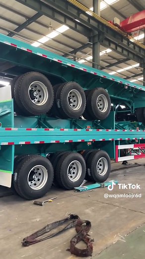 Durable construction: Container flatbed trailers are typically made of high-strength steel, ensuring excellent strength and durability to withstand heavy cargo transportation. Smooth surface: The design of the trailer body is flat, suitable for transporting containers or other large goods, providing a stable support platform. Versatile design: Can be adjusted and modified as needed to meet various types of cargo transportation requirements. Strong adaptability: Suitable for both long-distance an