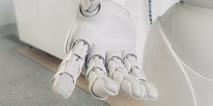 AI researchers test a robot’s dexterity by handing it a Rubik’s cube