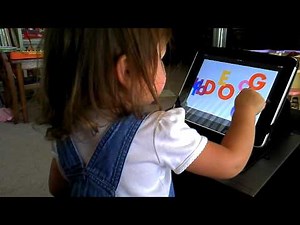 Emily plays the Word World game