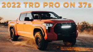 In this episode of the Build Series we fit 37s on a brand new 2022 Toyota Tundra TRD Off Road with only a leveling kit! This is a special leveling kit by Westcott Designs made specifically for the new Tundra's. This build turned out great and after testing had no rubbing with a significant increase in clearance. Check out our inventory at LiftedTrucks.com We pride ourselves on the work we do, the parts we use, and the experts we employ to build out our trucks. | Lifted Trucks