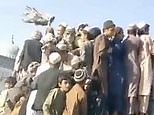 People seen atop Humvee as Taliban take Kandahar