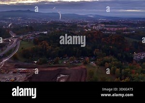 suburban growth scene, expanding suburbs with infrastructure, aerial view of suburban development