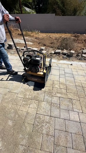 how to compact pavers