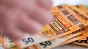 euros bill .Hands counting euro bills.Currency notes and symbols. salaries and benefits in Europe. Cash payments in the European Union. 4k footage
