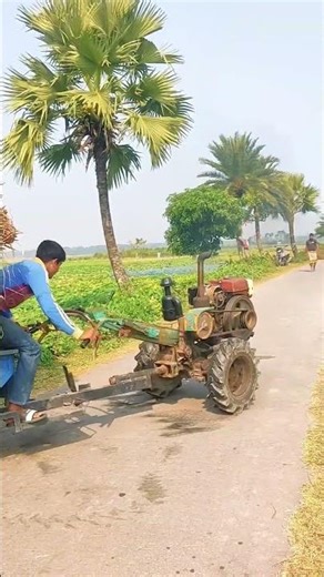 The process of a tractor fully loaded with newly harvested grain getting on the road