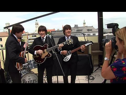 Die Beatles über den Dächern von München