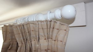 Fixing Curtain Poles and Rails
