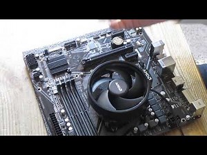 AMD CPU cooler installation. How to install AMD AM4 processor and AMD Wraith cooler on motherboard.