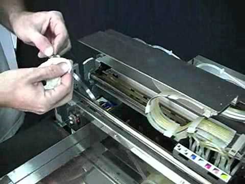 DTG Kiosk cleaning the encoder strip
