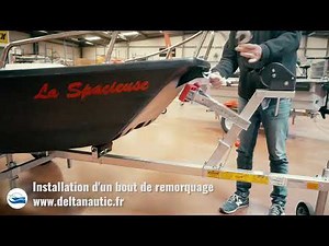 Installation d'un bout de remorquage sur une barque