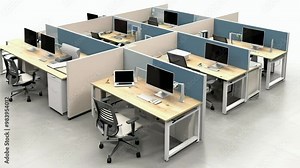 Modern office layout featuring cubicles with computers and ergonomic furniture.