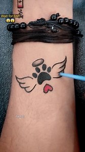 Paw Print with Wings 🐾❤️ #tattoo #pawprinttattoo #minitattoo #tattooideas #tattooartist #trending #viral | Renu Kumari