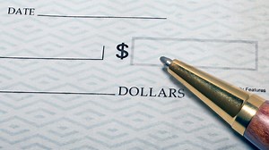 Here's What Color Ink You Should Use to Sign Your Checks to Avoid Fraud, According to BBB