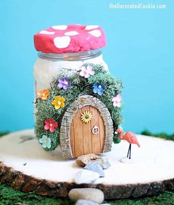 Fairy house idea: Air-dry clay and mason jars make a light-up fairy garden.