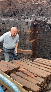 67M views · 110K reactions | George Mcdonald cutting turf for burning in his home fire. George has been doing this since the mid 70's using a special spade that is at least 100 years old. at the end of the video you can also see his Grandson, Jack having a go at it. I tried it myself and its much much harder than it looks. | Awesome Earthmovers | Facebook
