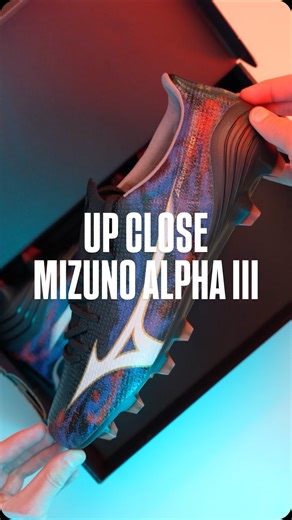 Fresh out of the box - here’s a closer look at the @mizunoaustralia Alpha III. The Mizuno Alpha III arrives with that unmistakable Made in Japan feel the moment you lift the lid. Every detail feels intentional: from the way the upper wraps the foot to the sharp, aggressive stud layout underneath. This is a speed boot built with precision, not shortcuts. Blackened tones with deep blue hues and flashes of red give it a cosmic, almost glowing look in hand - subtle until the light hits, then unmista