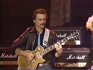 389K views · 10K reactions | Brian Setzer and Dickey Betts playing together at the Guitar Greats concert live from The Capitol Theatre. Passaic, NJ. November 12, 1984. Together they played "Barbwire Fence" from Setzer's The Knife Feels Like Justice album. Brian wrote this song in tribute to Dickey, who was one of his early influences. | Brian Setzer | Facebook