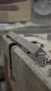 Shaping a Wooden Beam by Hand in the Workshop
