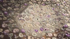 Can you embroider on tulle? This intricate technique helps create second-to-none chef d'oeuvres that you can turn into a special occasion dress or gown. Enjoy the hypnotizing dance of sequined flowers, glass beads and satin stitch embroidery, designed solely to inspire you. | Tissura.com Luxe and haute couture retail fabrics online shop