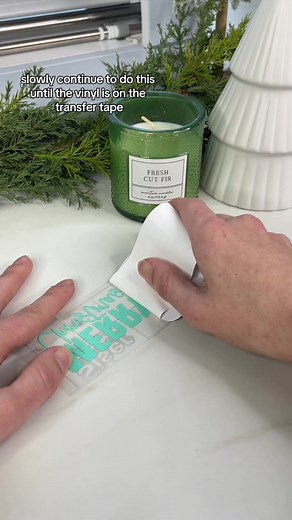 If you’re struggling to get your transfer tape to pick up your vinyl, I have a great hack for you! When picking up glitter vinyl, it can be more difficult for the standard transfer tape to pick it up. My first tip is always to scrape the back of the vinyl and remove the backing, but if that doesn’t work, you can try this hack! Place your scraper tool up against the vinyl backing. Start taking the backing away while also pressing down on your scrapper tool at the same time. Slowly continue to do 