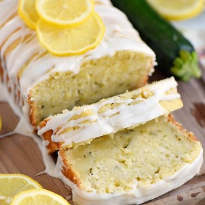 🍋 LEMON ZUCCHINI CAKE 🍋 - definitive proof that lemon and zucchini belong together! Beautifully moist and undeniably delicious, this easy cake is topped with a lemon glaze that will keep you coming back for one more slice. 💛 PRINT RECIPE HERE: http://www.momontimeout.com/2017/06/lemon-zucchini-cake-recipe/ In partnership with Almond Breeze. | Mom On Timeout