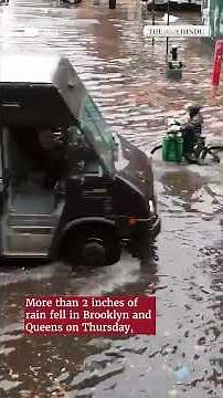 Heavy rain and flash floods bring New York City to a standstill