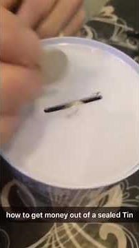 How to get money out the money tin without opening it
