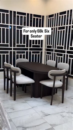 6.2K views · 585 reactions | This modern 6-seater dining set is the perfect blend of style and comfort. ✔️ Sleek oval table with ribbed base ✔️ Soft, cushioned chairs in light grey ✔️ Durable dark wood finish Whether it’s family meals or hosting guests, this set makes every moment special. ️  For only 68K – comfort & class all in one!  Available now at BACH Furniture. | BACH Furniture | Facebook