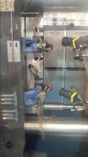 Side-Entry In-Mold Labeling System | NPC Injection Molding Machine