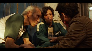 4K views · 145 reactions | The layout of the marbles game acts as a voice from the past, just as Player 001 had intended. "This world was designed from Il-nam’s memories," says Production Designer Chae Kyoung-sun. "Life and death, reality and fantasy...They all exist within the same space in these games." | Squid Game | Facebook