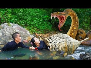 Dwarf Family Faces Giant Python Attack While Fishing in the Remote Wilderness