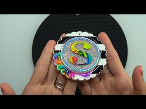 How to make a layered acrylic keychain with loose glitter and printed vinyl.