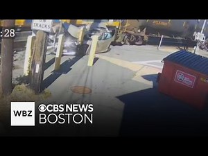Video shows freight train destroy car on the tracks in Andover
