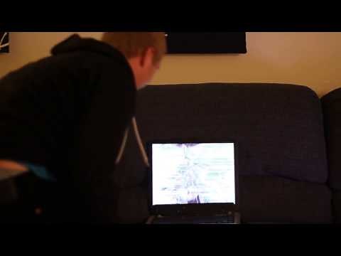 Guy punches his computer screen, it shatters, he has an angry wife
