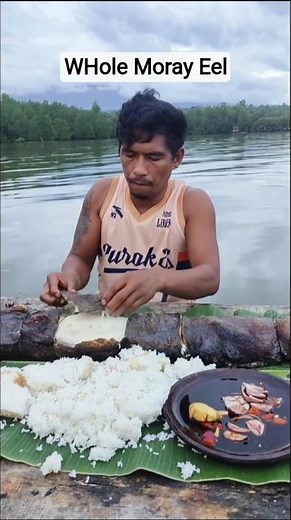 Eating a GIANT Rare Moray Eel—Whole Grilled on River!