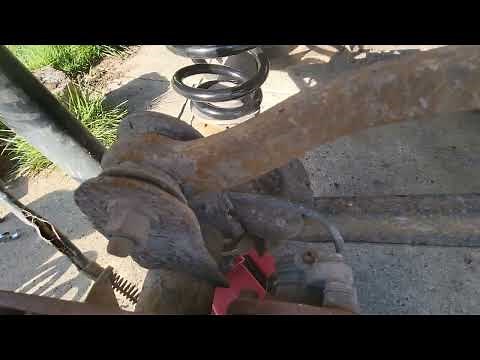 Changing the suburban's rear coil springs