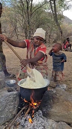 Hadzabe Tribe Woman Cooking Traditional Ugali in the Heart of the Wild 🍲#shortsfeed #hadzabe#cooking