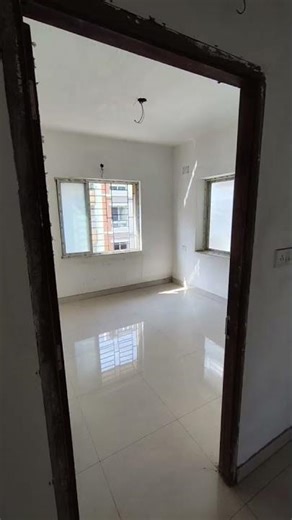 On sale New town action area 1 Dd block 1440 sqft 2nd floor g+4 3bhk 2 bath 1 op parking. @ 96 lac.