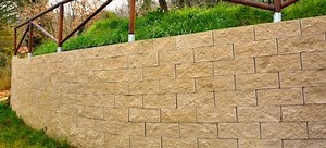 How to Build a Curved Brick Retaining Wall | DoItYourself.com