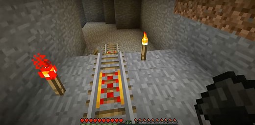 How to use powered rails efficiently in Minecraft