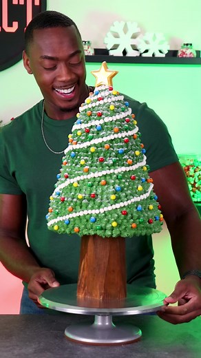 How I made this Christmas Tree cake! I had to be a little creative with making the base of the tree, but it all worked out. #cakedecorating #christmastreedecorating #christmascake | The Sweet Impact