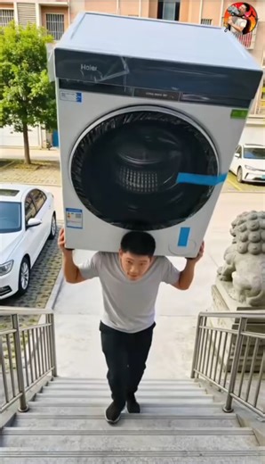 Guy Tumbles Down Stairs Carrying Washing Machine