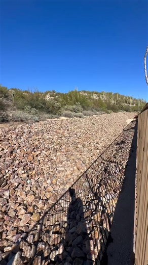 Installing rip rap for erosion control is often also installing a rattlesnake den. These piles of rock are perfect thermoregulatory opportunities, and won't go unnoticed by rattlesnakes and other reptiles. Here's one that Jeff ran into while putting together a Rattlesnake Fence estimate today. Some tips while installing rip rap to help reduce the chances of it becoming a rattlesnake den: - Use smaller rocks of relatively uniform size if possible. Avoid larger boulders (larger than a cantaloupe)