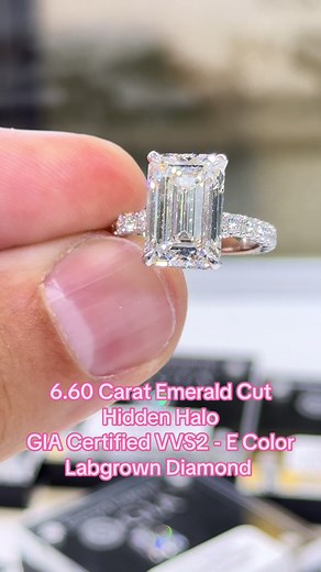 GIA Certified 6.60 Carat Emerald Cut in our signature hidden halo setting VVS2 Clarity E Color Labgrown Diamond. 2.5mm band width in 14K White Gold. 1.24 Carats of Round Ideal Brilliant cut VVS clarity D color compliment this gorgeous 1.49 Ratio Emerald Cut. Total of 7.84 Carats #labgrowndiamonds #labgrowndiamond #emeraldcut #engagementring #emeraldcut