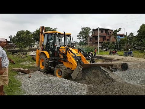 JCB Leveling Mud on Construction Site