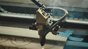 Industrial cutting machine cutting fiber - Free Stock Video