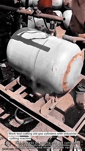 Work tool cutting old gas cylinders with industrial cutting machine
